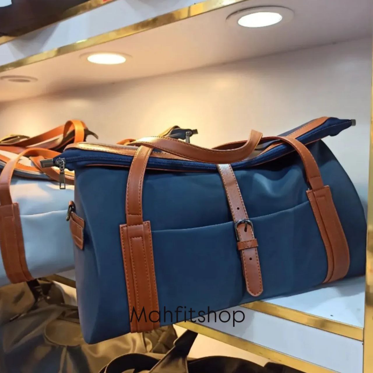 ساک مسافرتی ضد آب بند چرمی خمره‌ای | ساک ورزشی شیک و مقاوم برای سفرهای کوتاه 5506 تصویر شماره 1